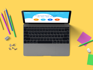 MacBook With Stationery on a Desk