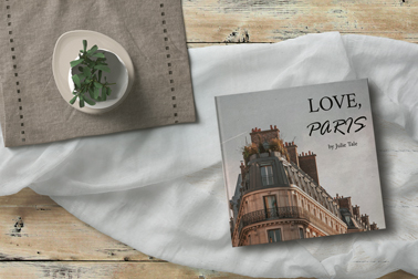 Closed Book on a Wooden Table