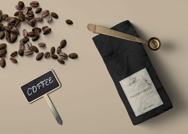 Coffee Pack With Beans and a Metal Spoon