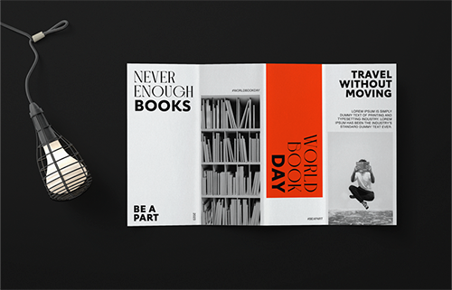 Open Brochure With a Lamp