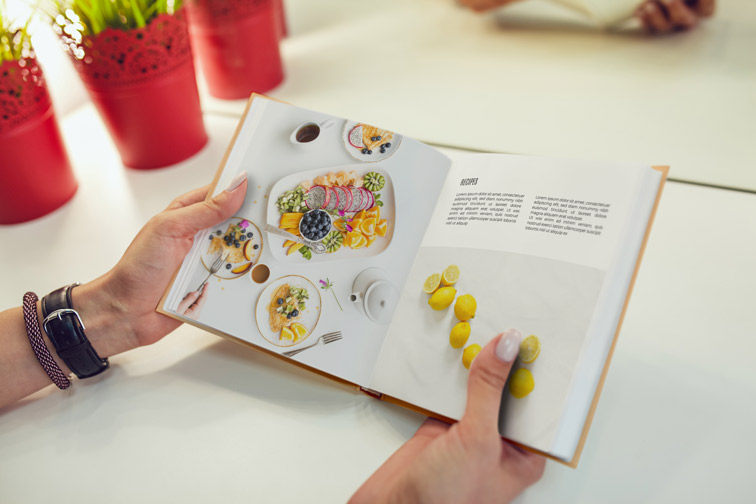 Hands Holding an Open Book