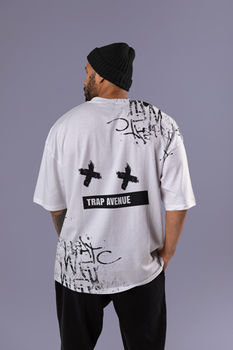 Man Posing in an Oversized Outfit