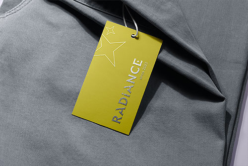 Clothing Tag on Grey Fabric