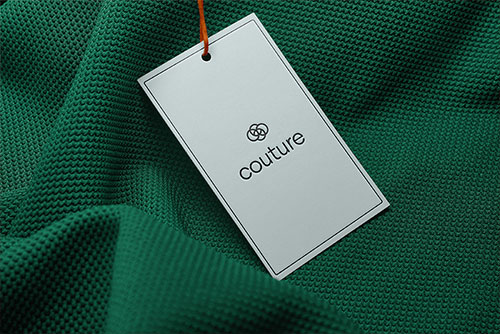 Clothing Tag on Green Fabric