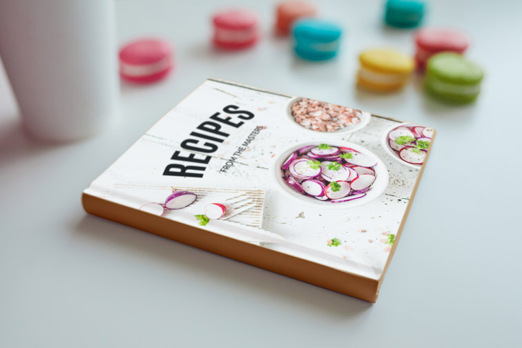 Book with a Cup and Macarons