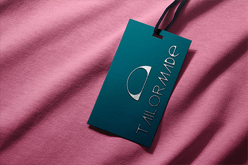 Apparel Tag on Pink Fabric