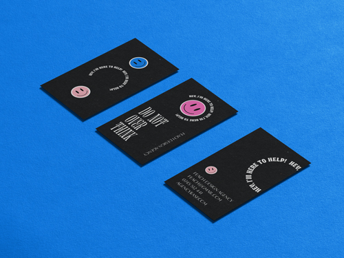 Business Cards Laid on a Blue Surface