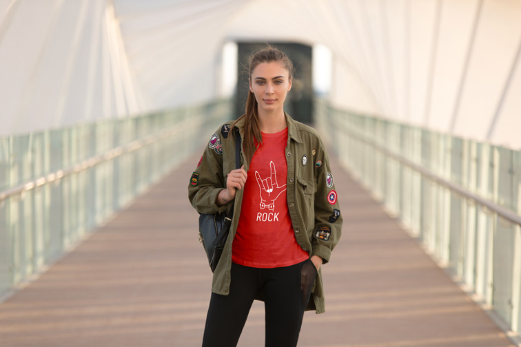 Girl in a Casual Outfit Holding a Backpack