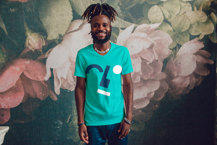 Man Standing on a Floral Background