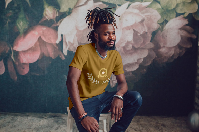 Man Sitting on a Chair and Looking Aside