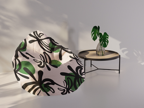 Soft Chair Next to a Plant