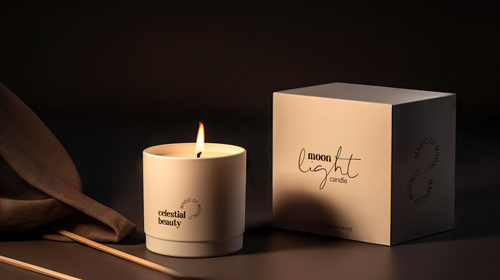Зажженная свеча рядом с коробкой