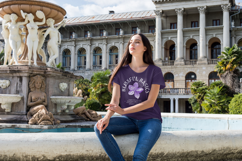 Woman Sitting at a Fountain