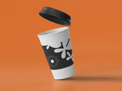 Paper Cup With Its Lid in the Air