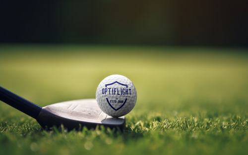 Golf Ball and Club in a Field