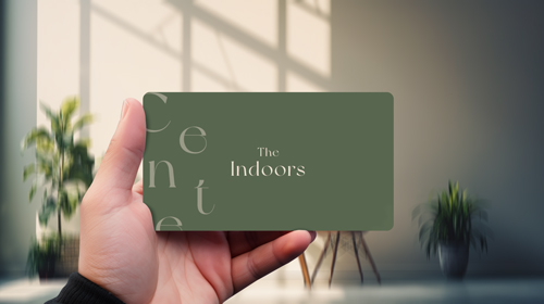 A Hand Holding a Card