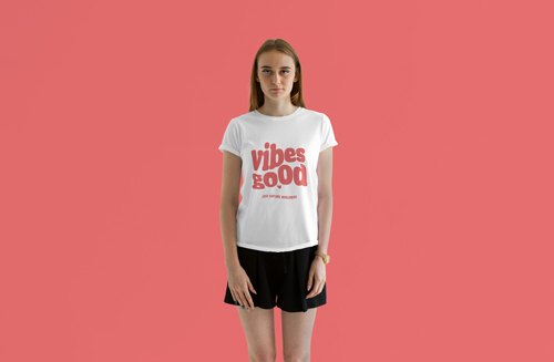 Girl in a T-shirt on a Light Red Backdrop