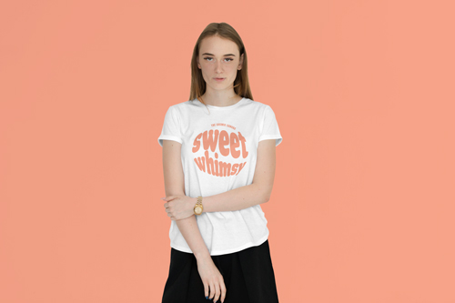 Girl in a T-shirt on a Coral Backdrop