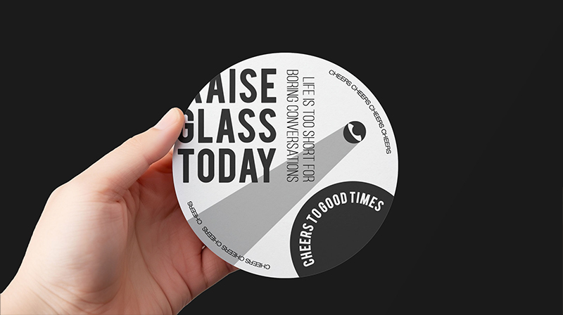 Coaster in a Person's Hand