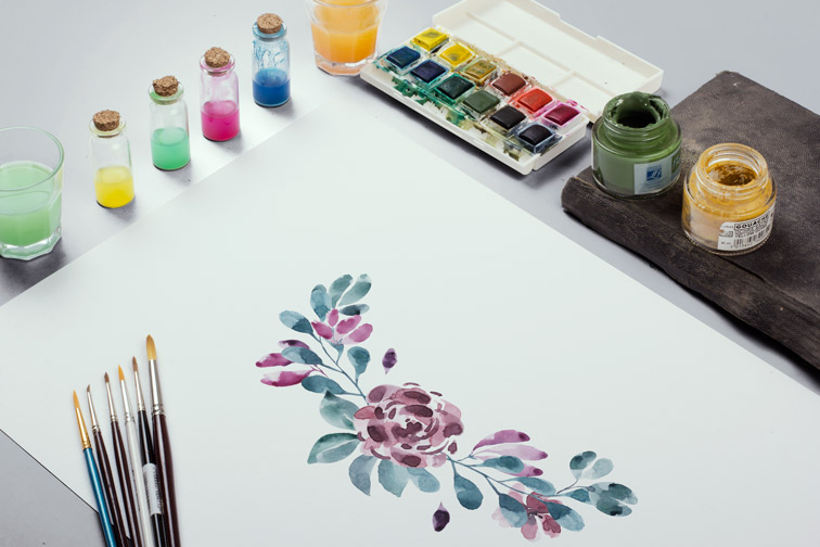 Paper Sheet with Watercolor Paints