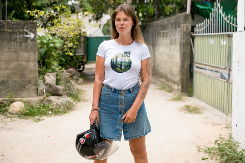 Woman in T-shirt Posing for the Camera