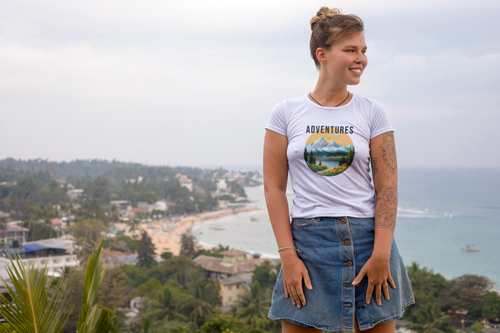 Woman in T-shirt Smiling and Looking Aside