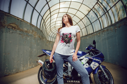 Woman in a T-shirt Posing for the Camera