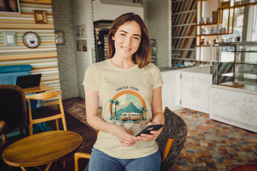 Woman in a T-shirt Smiling at the Camera