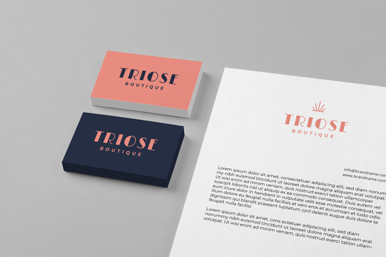 Two Stacks of Business Cards and a Flyer