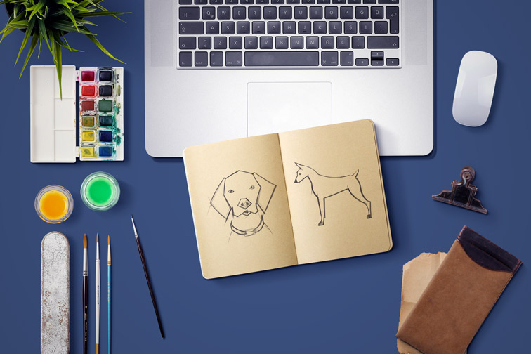 Designer Desk with Laptop and Drawing Tools