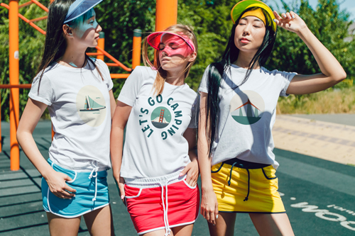 3 Girls in T-shirts Posing for the Camera