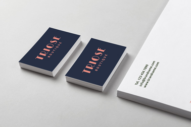 Business Cards and a Paper Stack