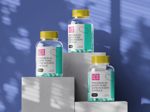 Three Pill Bottles Placed on Stands