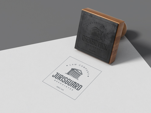 Wooden Stamp on a Piece of White Paper