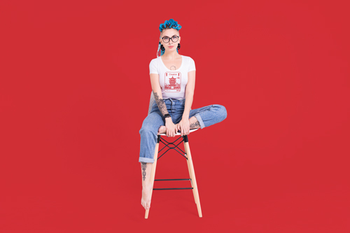 Woman Posing on a Wooden Chair