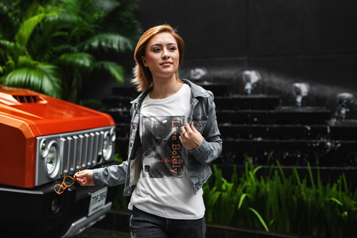 Girl Standing Outside Next to a Car