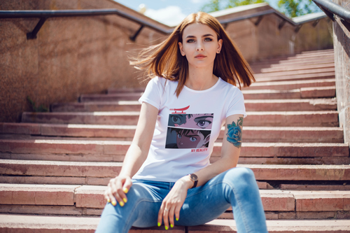 Woman in T-shirt Sitting on Stairs