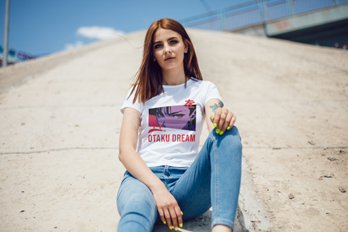 Woman in T-shirt Sitting on the Ground