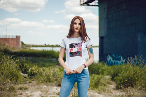 Woman in T-shirt Looking at the Camera