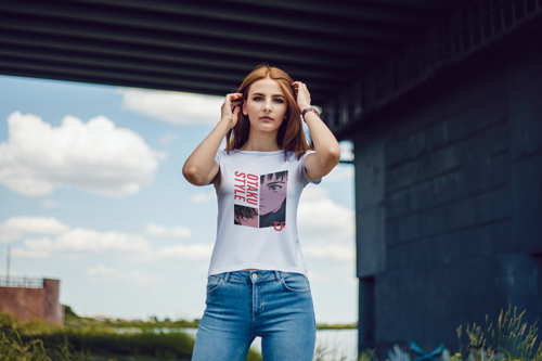 Woman in T-shirt Posing for the Camera