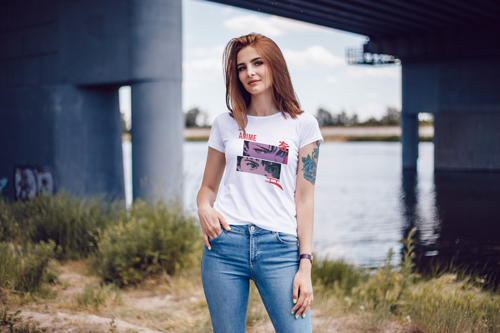 Woman in T-shirt Striking a Camera Pose