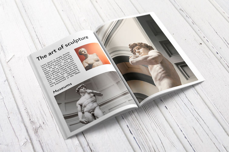 Open Magazine on a Wooden Background