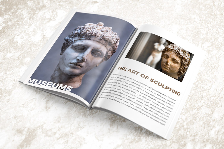 Open Magazine on a White Stone Texture