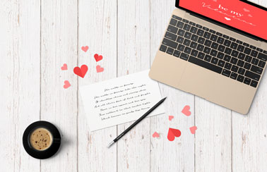 Valentine's Greetings on a Laptop Screen and a Card