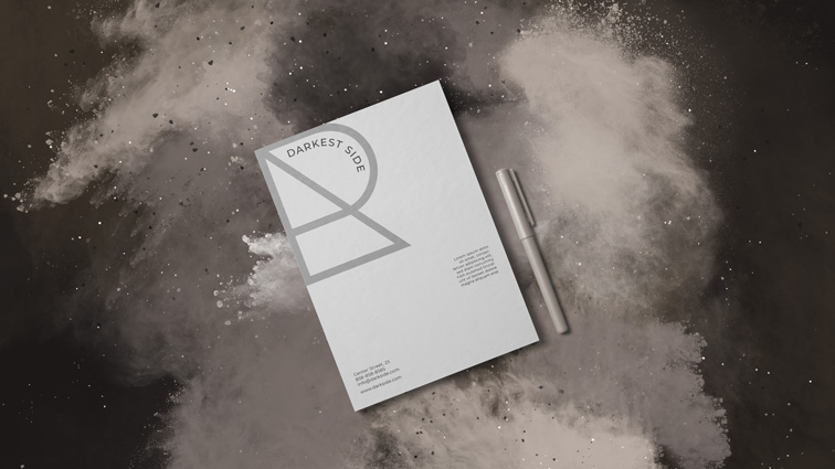 Flyer with Pen on a Grey Smoky Background