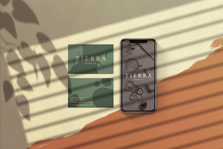 iPhone junto a tarjetas de visita