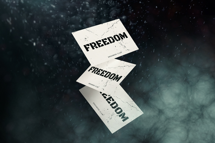 Tarjetas de visita sobre un fondo de partículas