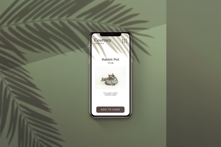 iPhone on a Palm Shaded Background