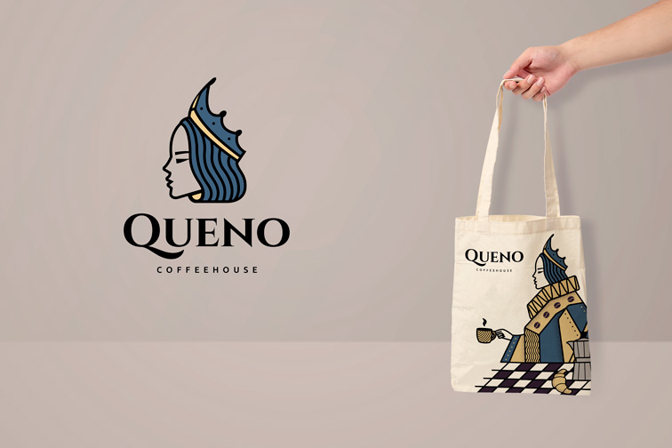 Hand Holding a Tote Bag with a Brand Logo