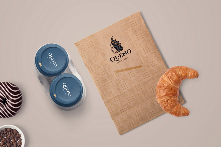 Paper Coffee Cups and a Flyer with a Croissant